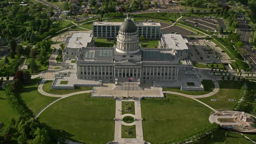  aerial footage of Utah State Capitol approaching from a bird's eye view in Salt Lake City Utah during a sunny day