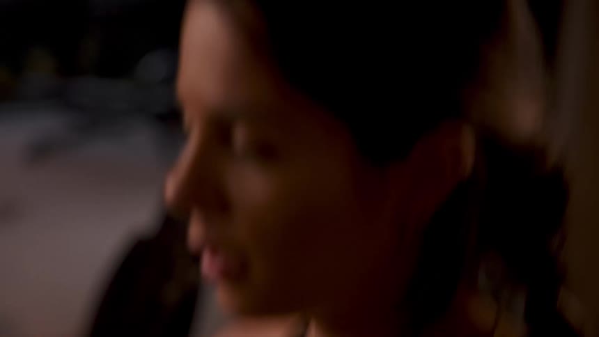 A woman is running on a treadmill