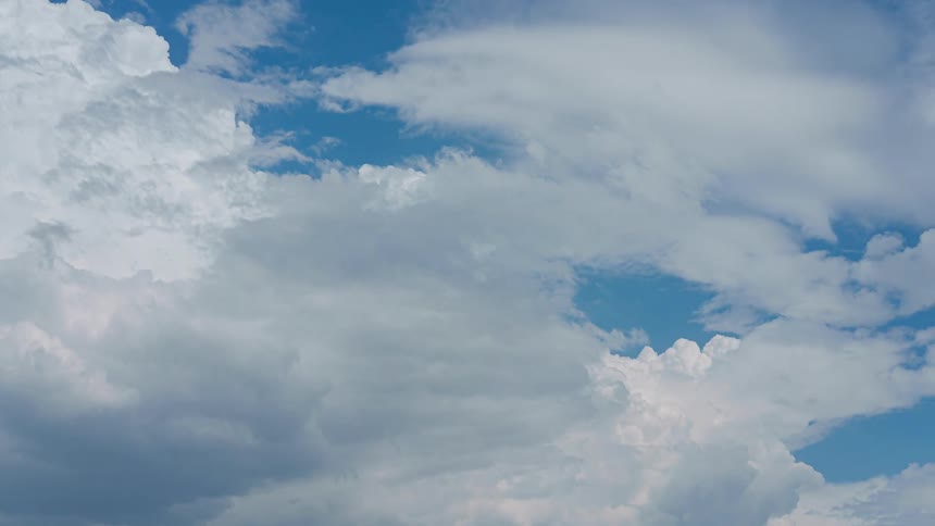 The clouds pass by in the sky