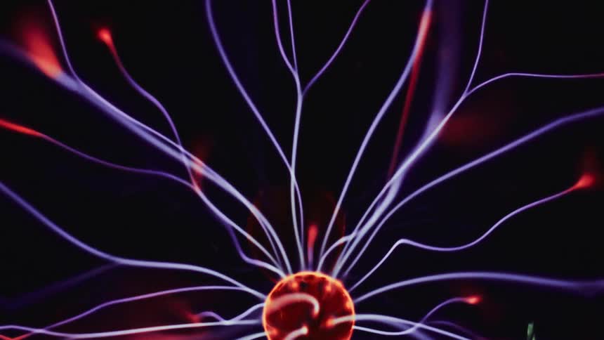 Close up of a plasma ball lamp on a black background