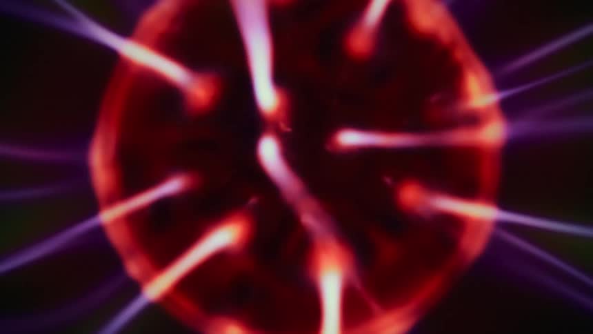 A sphere of electricity receiving a beam of purple energy
