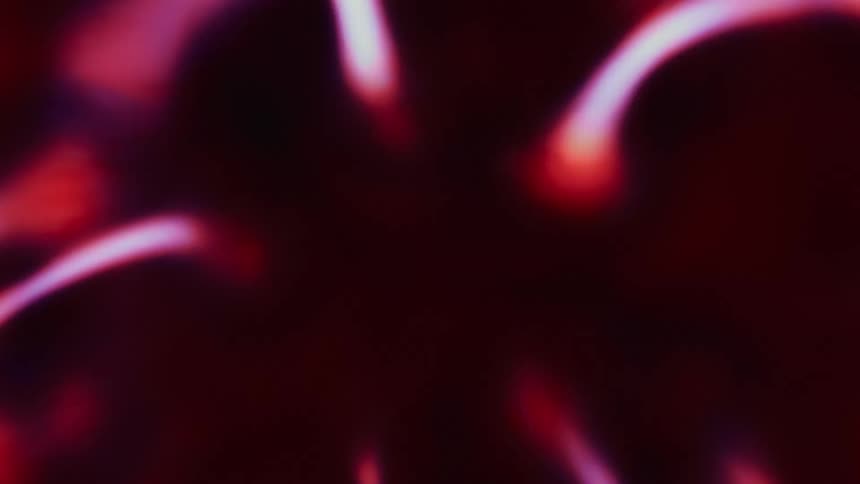 Abstract lights in blurred chaotic motion with a red coloration