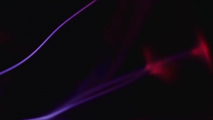 Purple light beam at night
