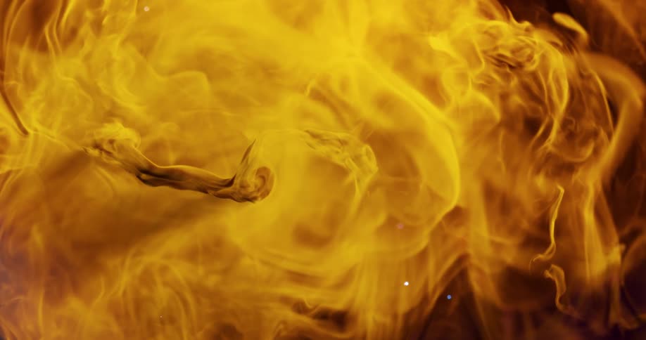 Yellow smoke clouds in the dark sky