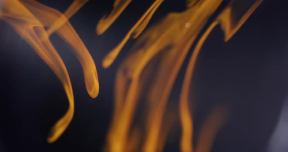 A smoky liquid exploding in a black environment