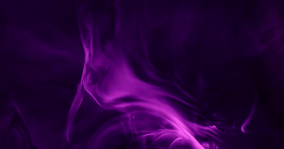 Purple smoke swirls against a black background