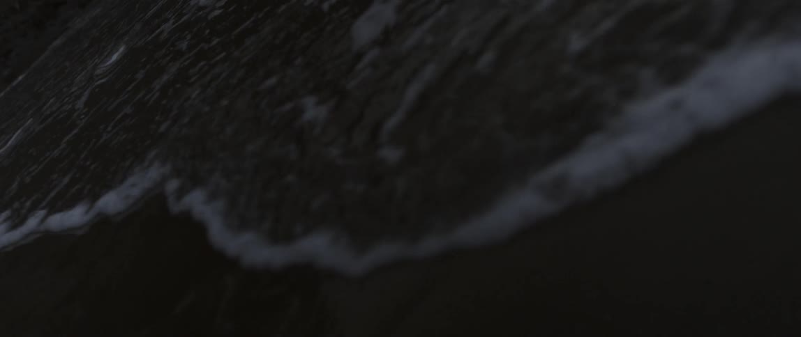 Water slowly creeps up on a beach