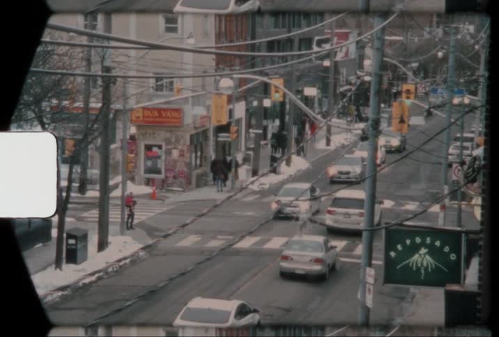 Cars and pedestrians on city street