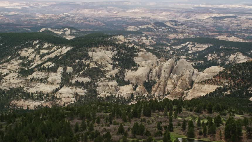 Aerial footage showcasing the majestic mountains rock formations and the beauty of Dixie National Forest in Utah during summer