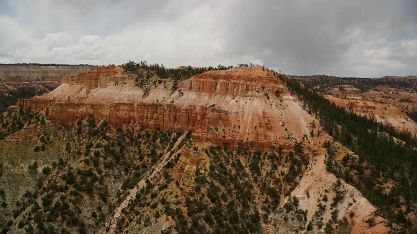 Incredible aerial view of a mesa with hoodoos trees and desert vegetation at Bryce Canyon National Park in Utah showcasing the stunning Southwest landscape