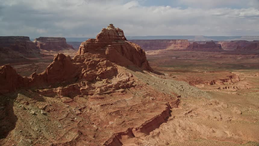 Aerial footage of flying over desert buttes on the Navajo Nation Reservation in Arizona during summer