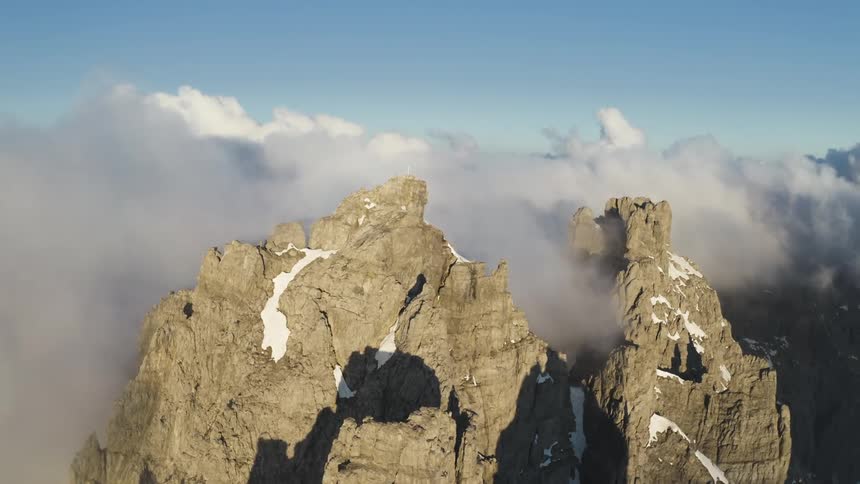 Aerial view of clouds covering the mountains