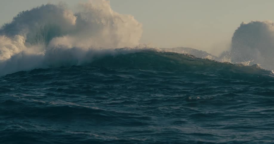 Large waves crash in the water