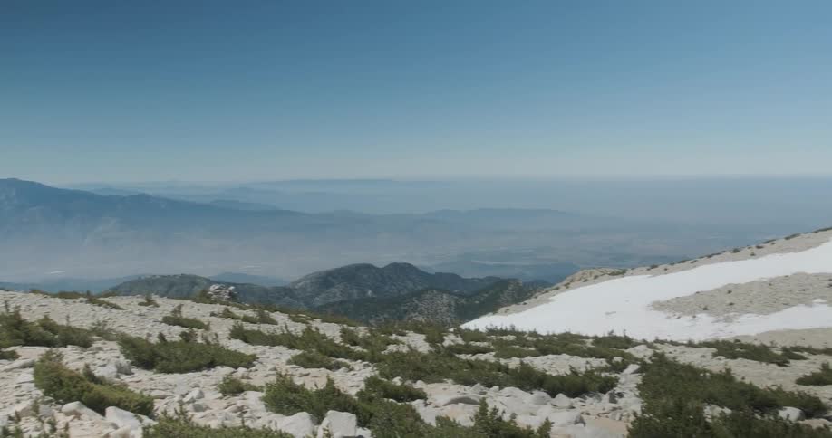 Snow and grass covered mountains