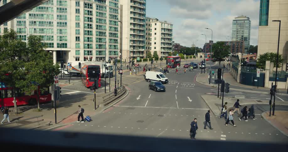Commuters and vehicle at London Tube station
