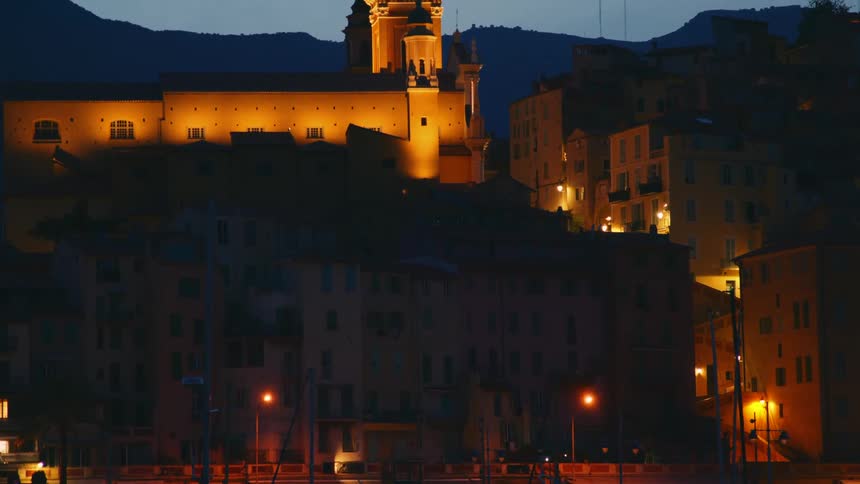 Castle style building lit at night