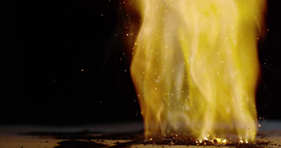 Gunpowder ignites in flames showering sparks