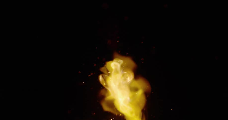 A flame burning in darkness