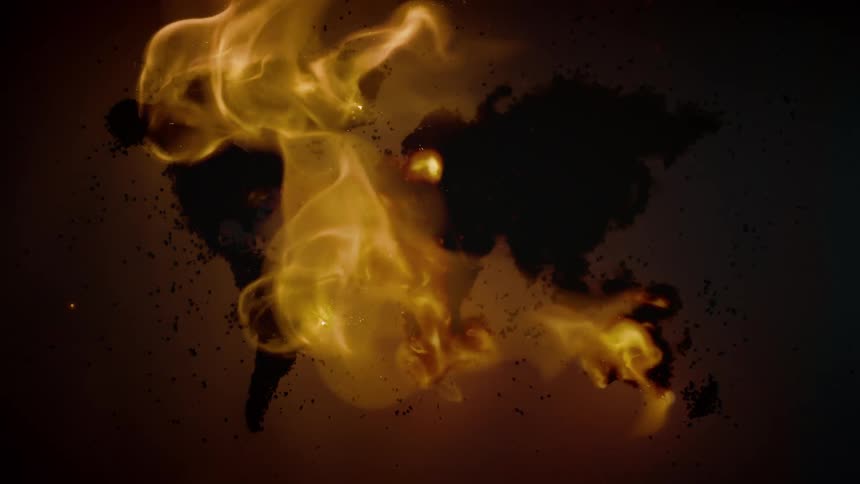 Fire burns on top of a global map