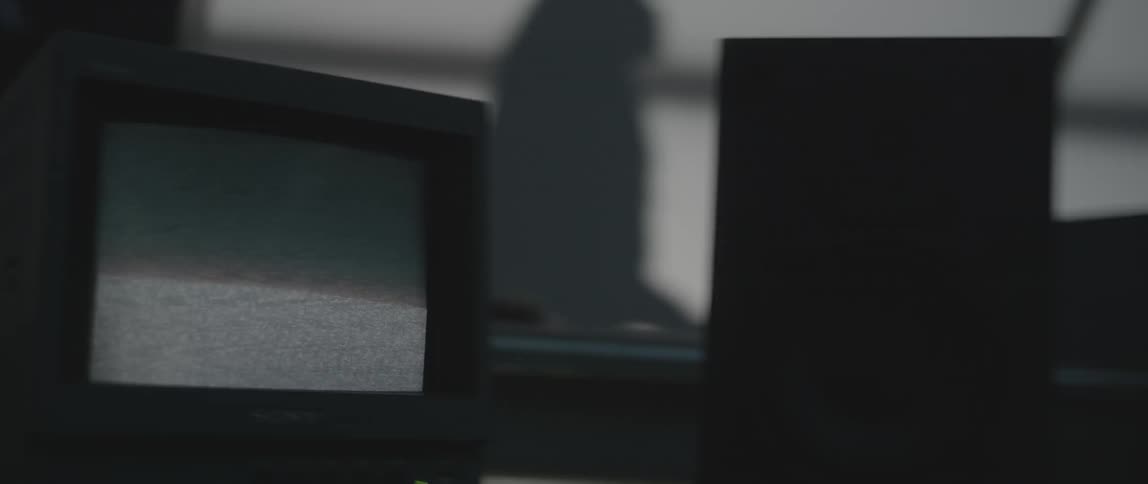 A small monitor is flickering static