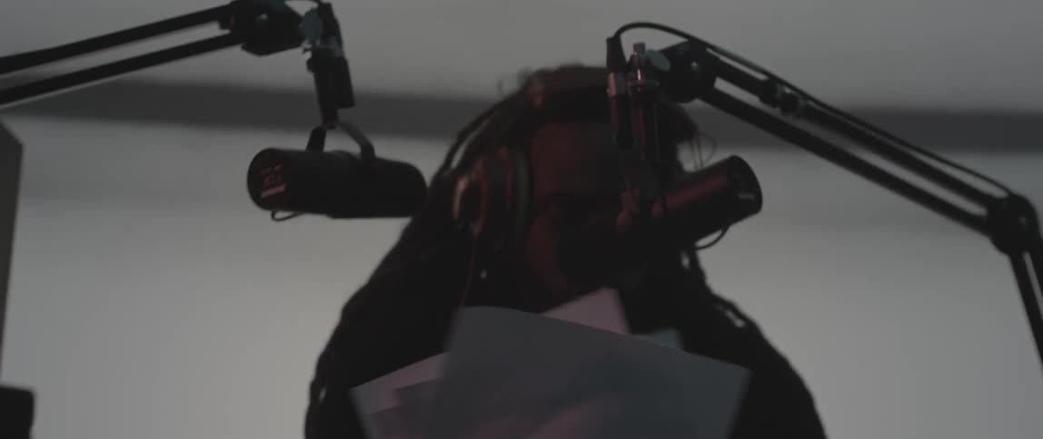 Dj performing and looking through his papers