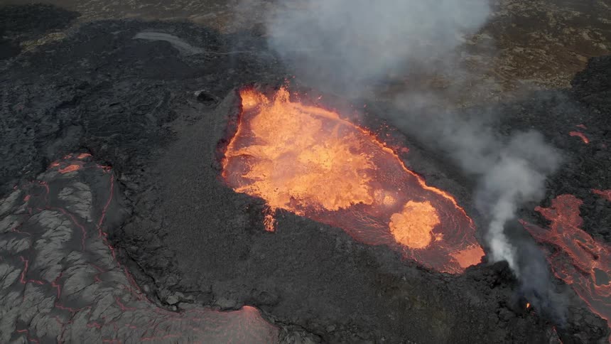 Aerial view of an erupting volcano