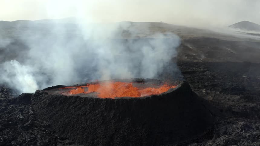 Aerial view of an erupting volcano