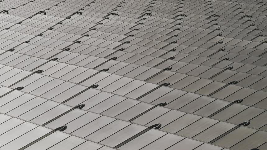 Rows of gray solar panels connected to each other