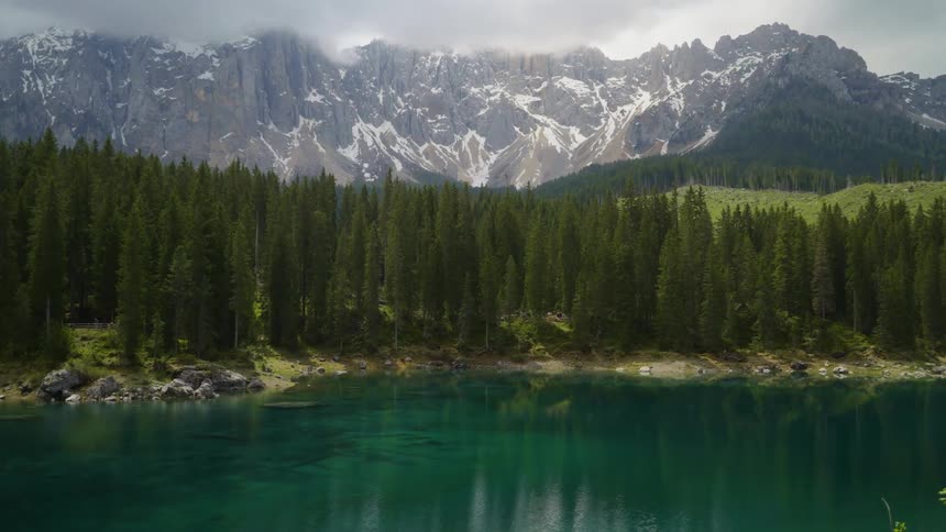 Lake with crystal clear water in the forest in winter
