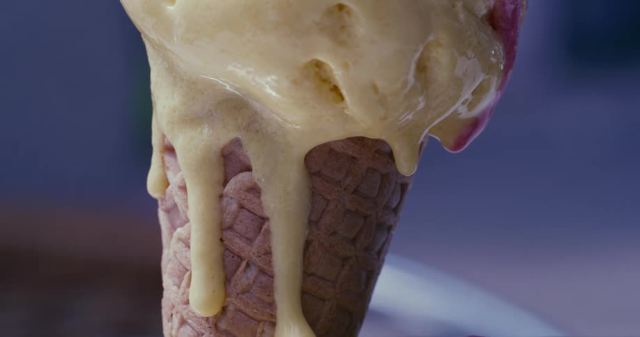 An ice cream cone melting