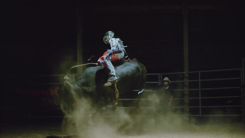 Extremely slow motion action of a bull rider