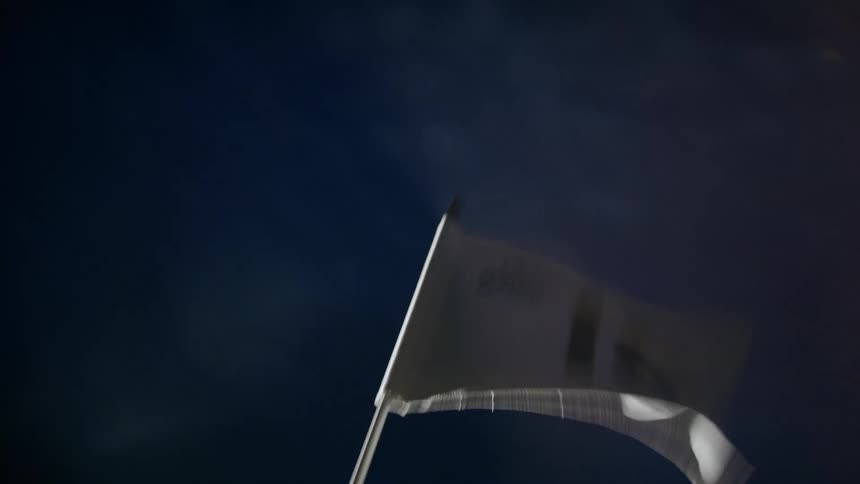 Eighteenth hole flag flaps in the wind