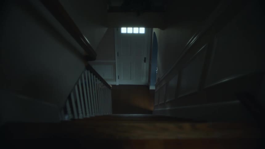 View of an interior wooden staircase in a house