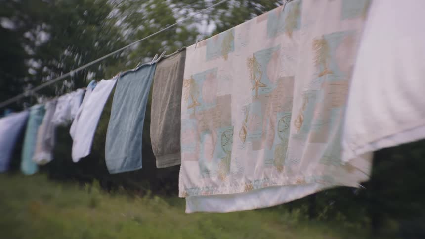 Clothes hanging to dry in the backyard