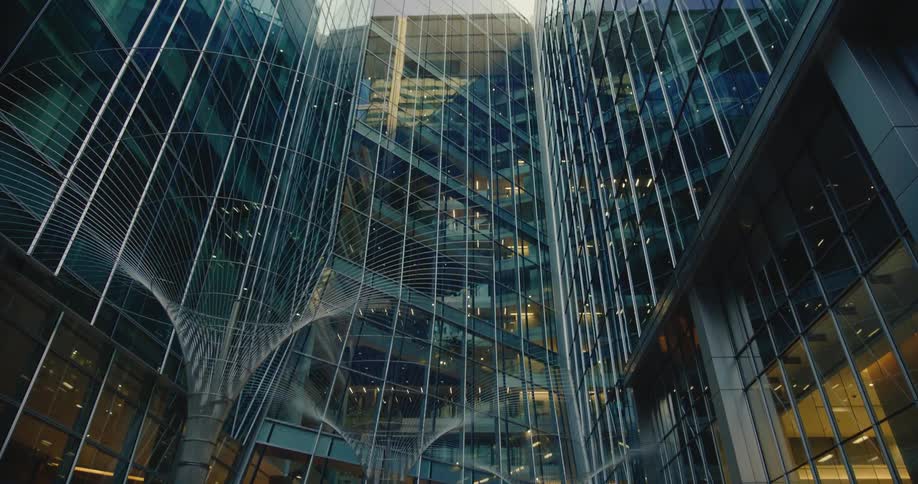 Metal sculptures fill exterior near inside angle of building