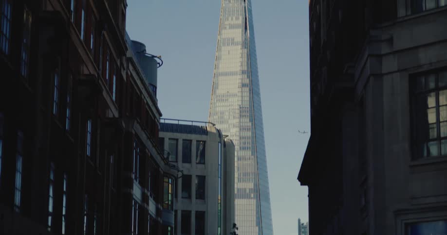 A few tall buildings are shown from bottom to top in a city neighborhood