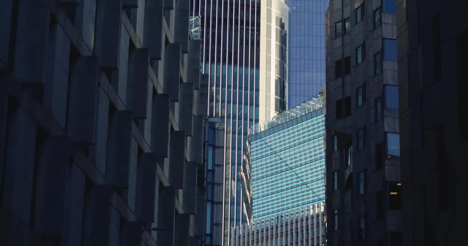 Facades of skyscrapers in the city at morning