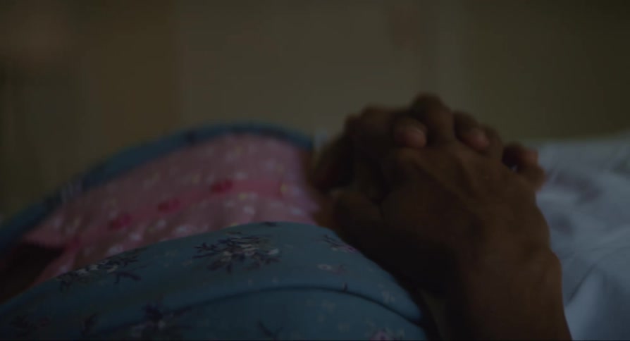 A lady sleeping with her fingers crossed
