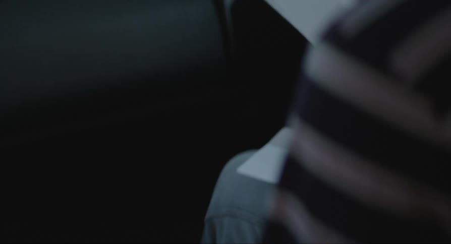 Closeup of a person receiving a letter and opening it