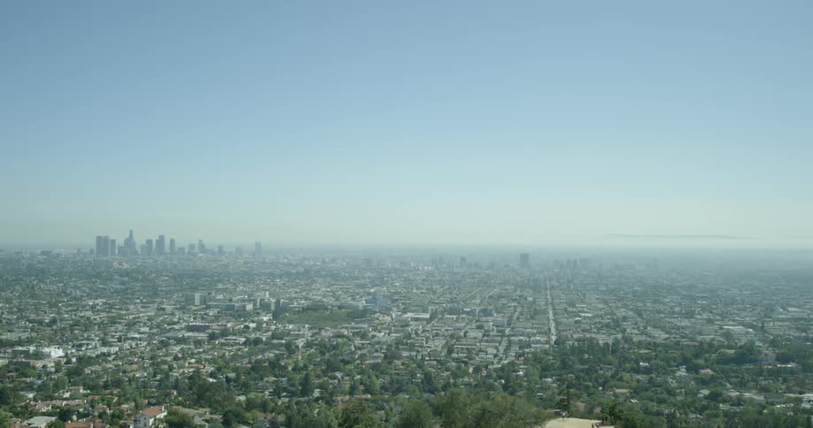 A town is below leading to a city