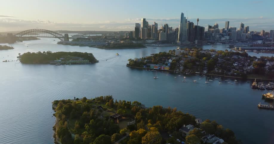 Aerial view of a coastal metropolis with islands boats and bridges