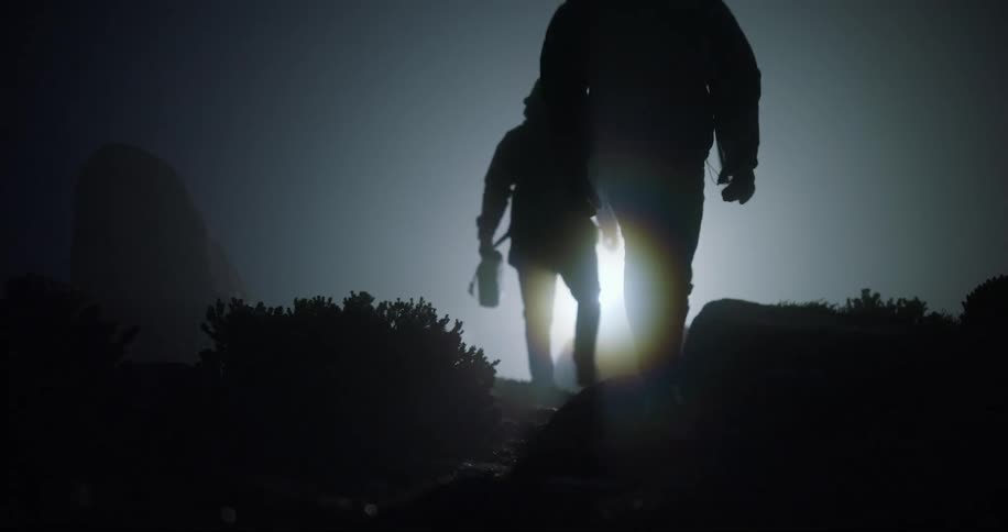 Two people were walking at dawn
