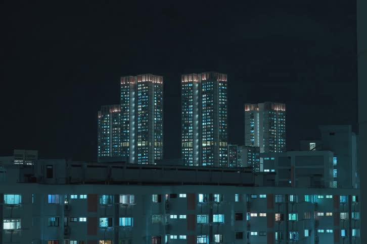Lights turning on in buildings during the night