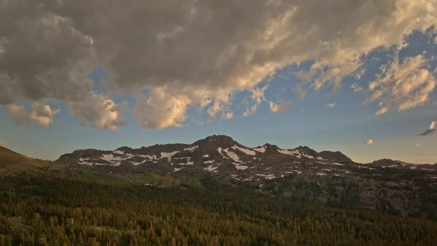 The field leads to the mountain range
