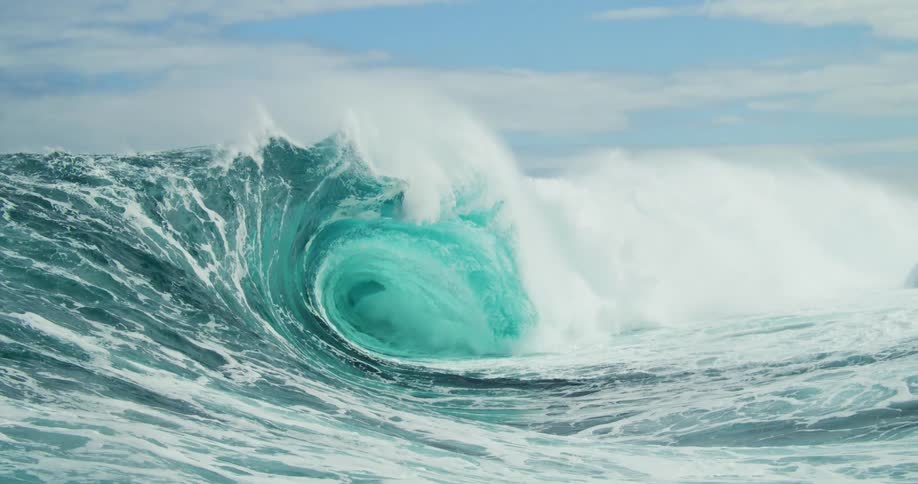 Enormous wave in motion with strength size and a lot of foam