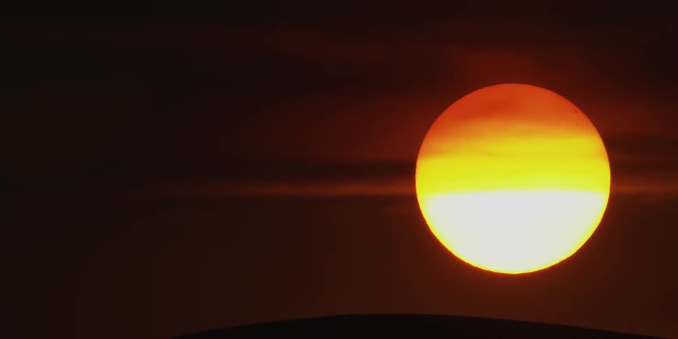Natural landscape with bright sun at sunset