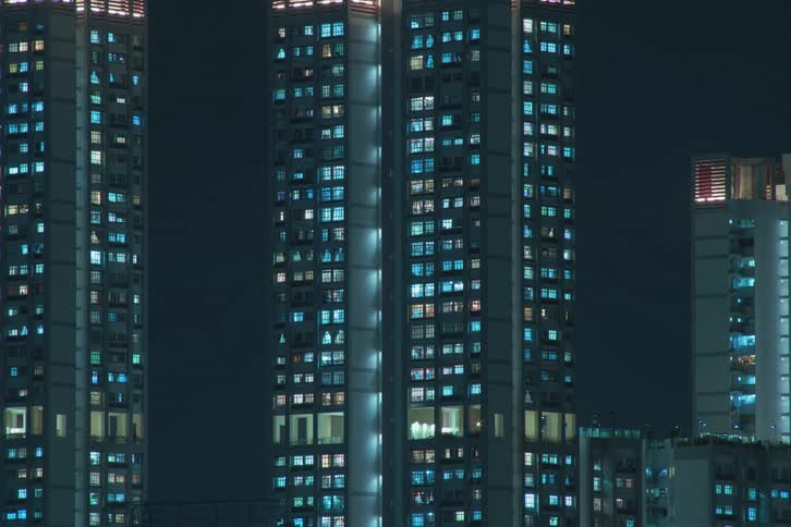 The buildings in the city light up at night