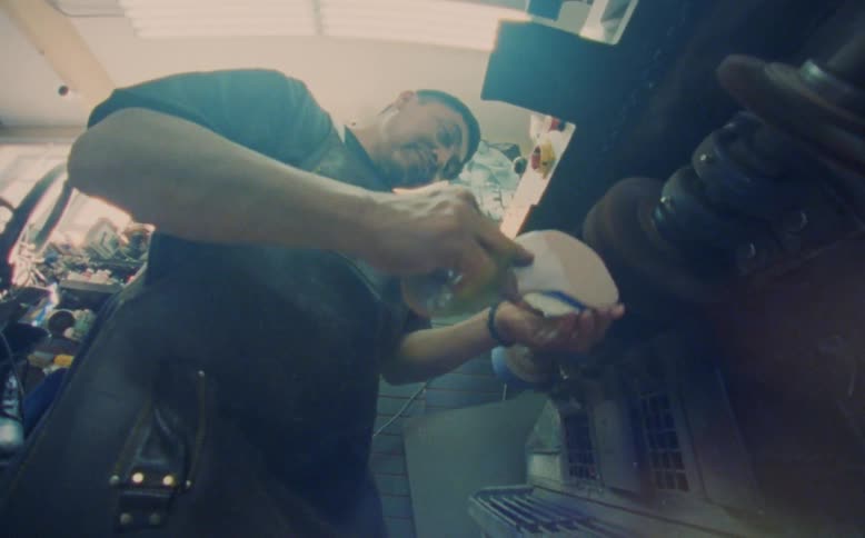 A man produces shoes in a factory