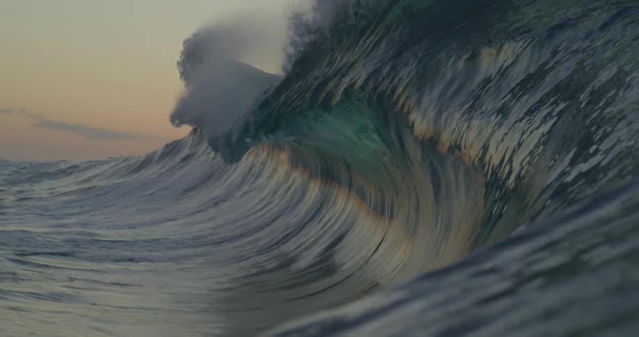 Waves moving on the sea at sunset