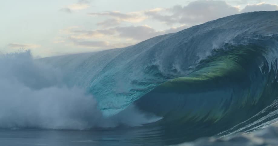 Water waves in the ocean at sunset